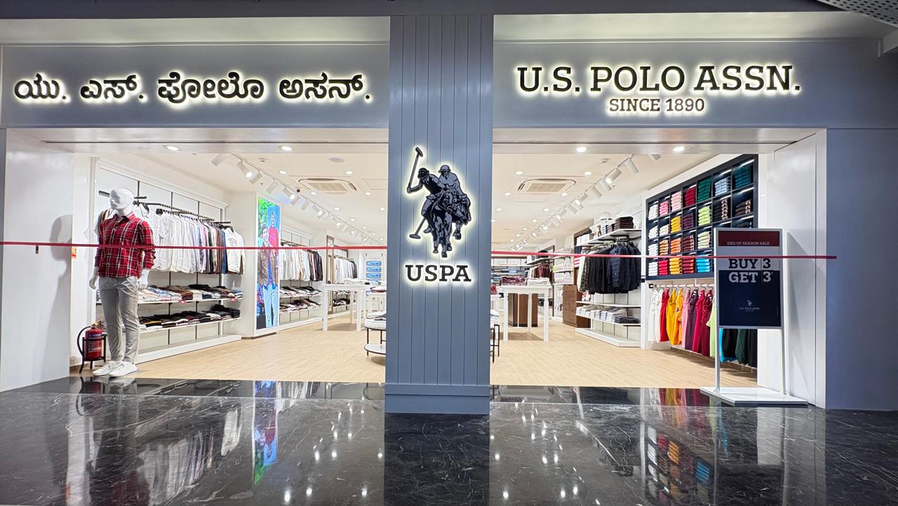 U.S. Polo Assn. mall storefront with backlit signage and the polo logo, delivered by Ananya Interiors in Bengaluru